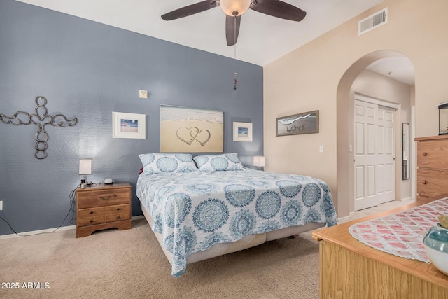 14575 W Mountain View Blvd Unit 12309, Surprise, AZ 85374 - carpeted bedroom featuring arched walkways and a ceiling fan