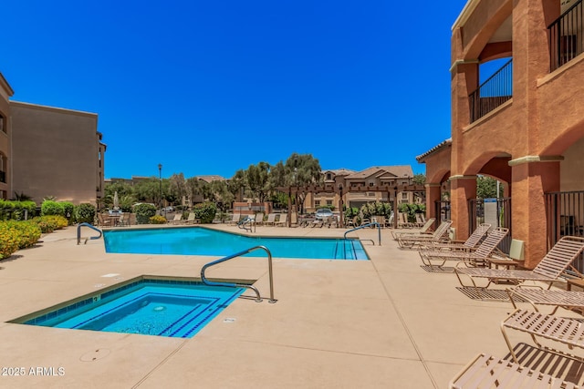 14575 W Mountain View Blvd Unit 12309, Surprise, AZ 85374 - community pool featuring a patio area