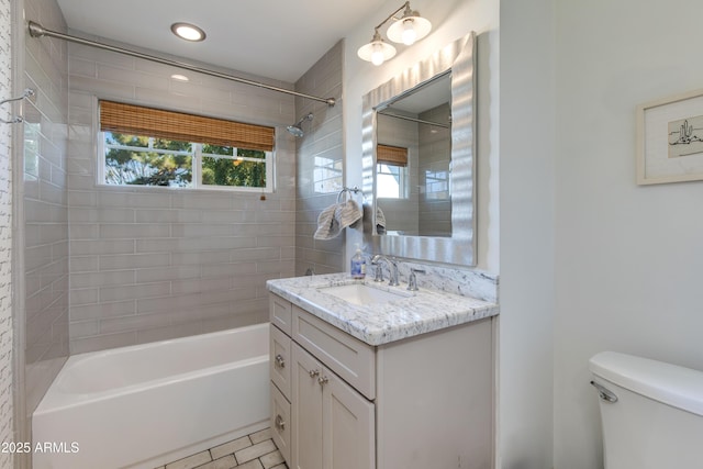 bathroom with shower / bath combination, vanity, toilet, and recessed lighting