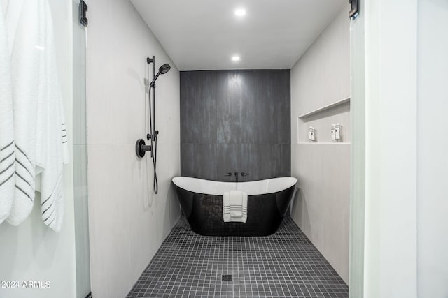 full bathroom featuring a shower, tile walls, recessed lighting, a soaking tub, and tile patterned floors