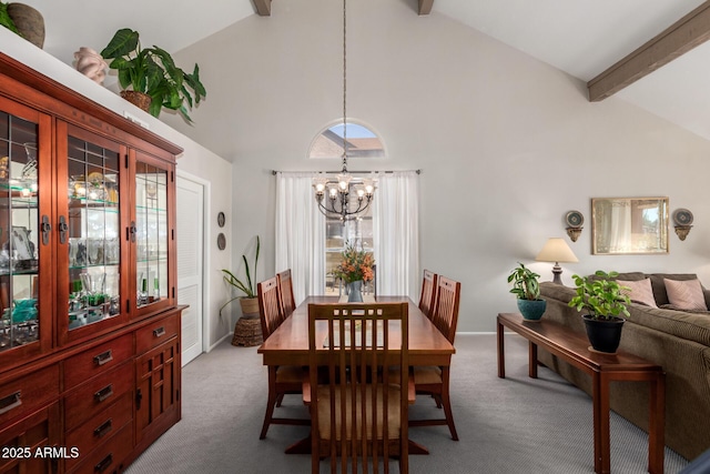 dining space with carpet, high vaulted ceiling, a notable chandelier, and beam ceiling