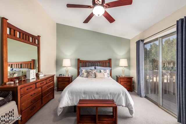 carpeted bedroom with vaulted ceiling, access to outside, and ceiling fan