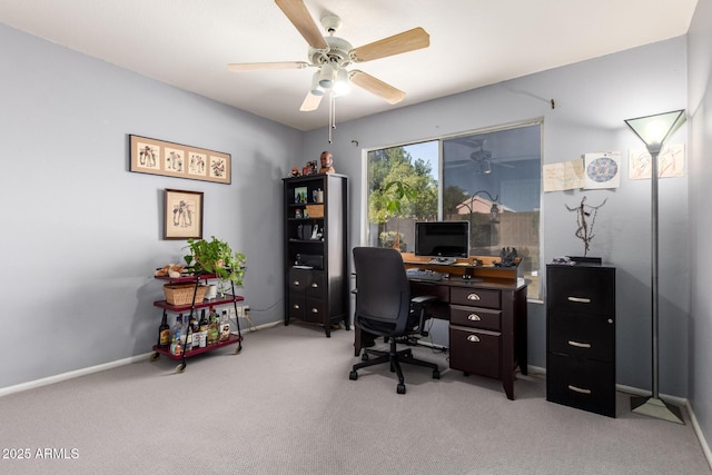 office featuring light colored carpet and ceiling fan