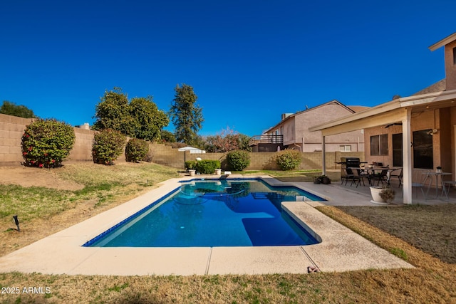 view of pool featuring ceiling fan and a patio