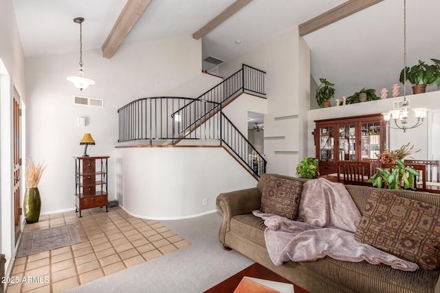 carpeted living room with beamed ceiling, high vaulted ceiling, and a chandelier