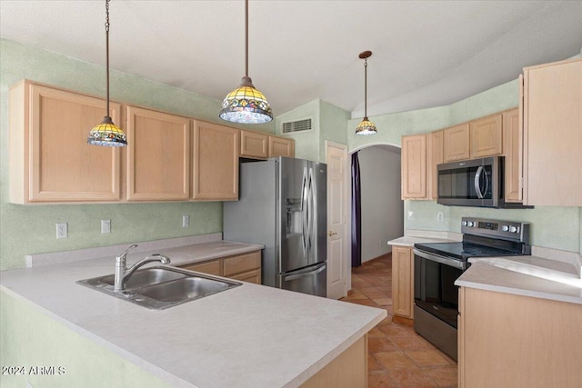 kitchen featuring sink, hanging light fixtures, kitchen peninsula, light brown cabinetry, and appliances with stainless steel finishes