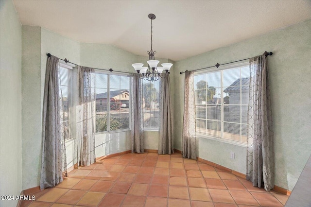 unfurnished dining area featuring vaulted ceiling, a notable chandelier, and light tile patterned flooring