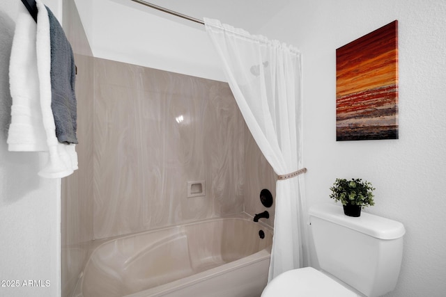 bathroom with shower / bath combination with curtain and toilet