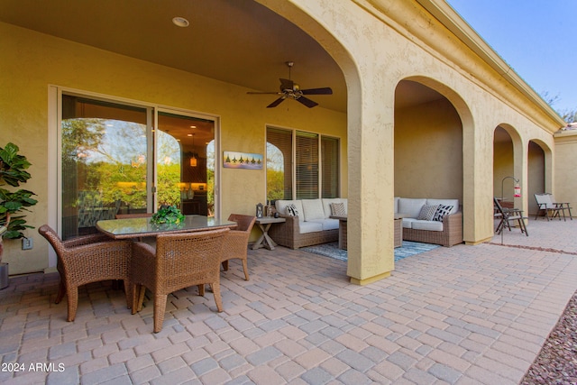 view of terrace featuring an outdoor hangout area and ceiling fan