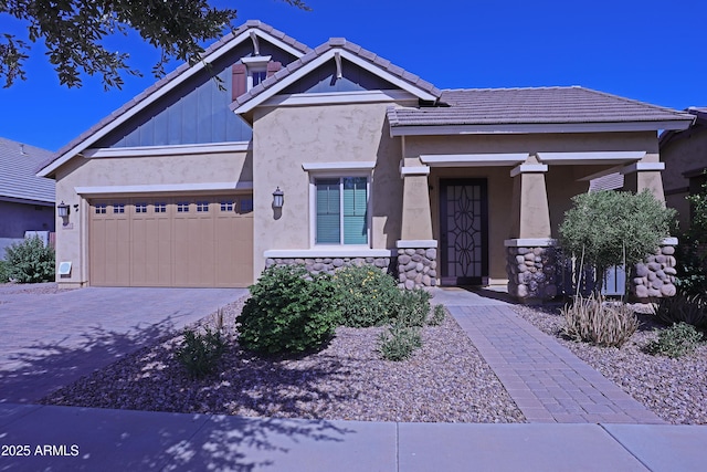 2811 S Jeffry St, Gilbert, AZ 85295 - view of front facade featuring driveway, a garage, stucco siding, a porch, and a tile roof