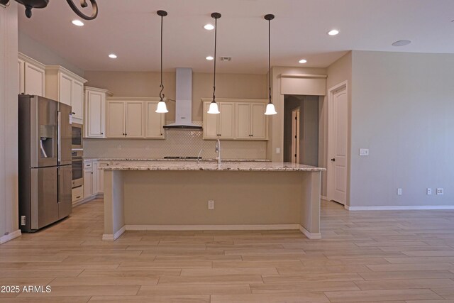2811 S Jeffry St, Gilbert, AZ 85295 - kitchen featuring appliances with stainless steel finishes, wall chimney range hood, light wood-type flooring, backsplash, and a center island with sink