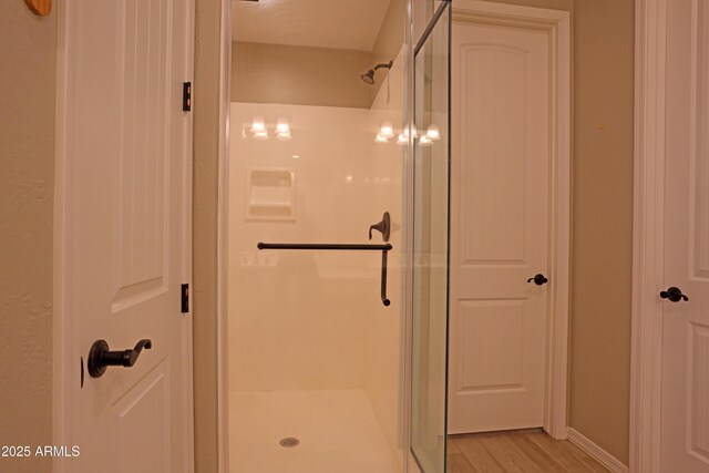 2811 S Jeffry St, Gilbert, AZ 85295 - bathroom featuring a stall shower and wood finished floors
