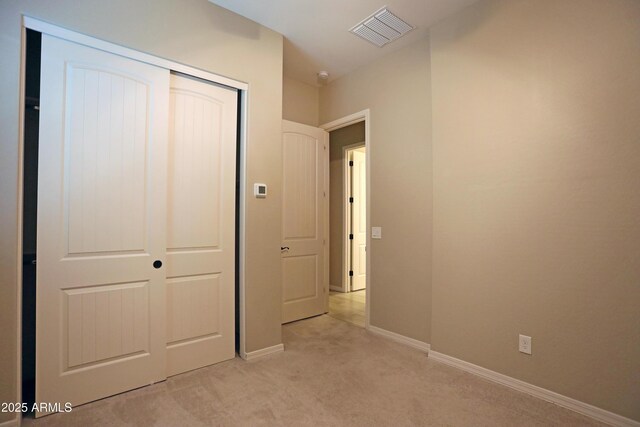 2811 S Jeffry St, Gilbert, AZ 85295 - unfurnished bedroom featuring light colored carpet and a closet