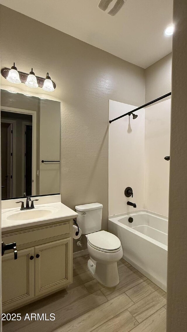 2811 S Jeffry St, Gilbert, AZ 85295 - full bath featuring vanity, shower / bathtub combination, and wood finished floors