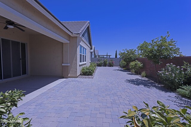 2811 S Jeffry St, Gilbert, AZ 85295 - fenced backyard with a patio area and a ceiling fan