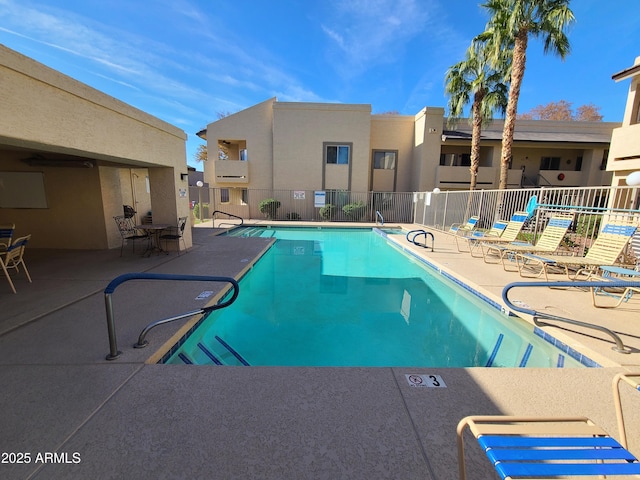 view of pool featuring a patio