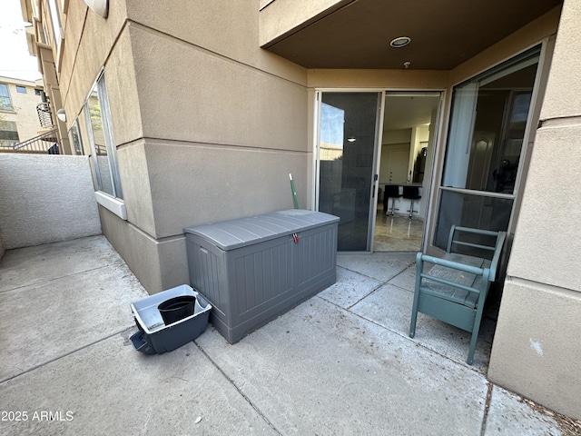 view of patio with a balcony