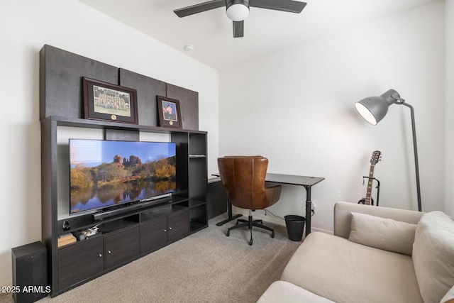 carpeted home office with ceiling fan