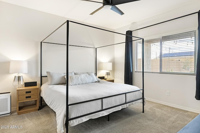 bedroom featuring baseboards, carpet, and a ceiling fan