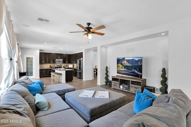 3436 E Gary Way, Gilbert, AZ 85234 - living area with a ceiling fan, visible vents, and recessed lighting