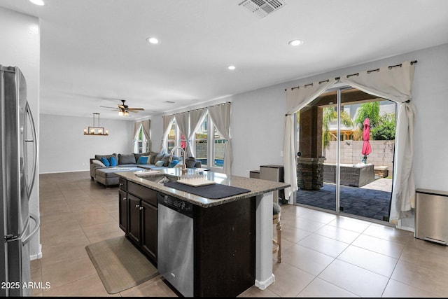 3436 E Gary Way, Gilbert, AZ 85234 - kitchen featuring a ceiling fan, visible vents, a sink, open floor plan, and stainless steel appliances