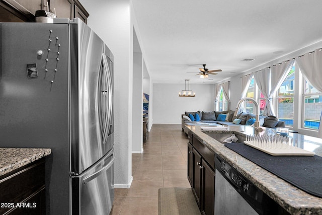 3436 E Gary Way, Gilbert, AZ 85234 - kitchen featuring light stone countertops, light tile patterned floors, visible vents, a sink, and stainless steel appliances