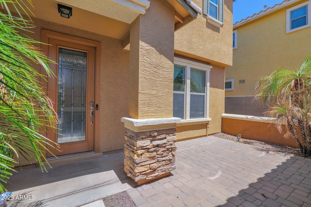 3436 E Gary Way, Gilbert, AZ 85234 - property entrance with a patio and stucco siding
