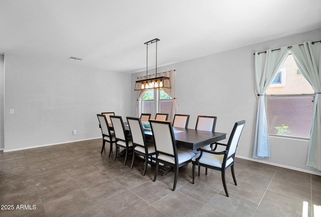 3436 E Gary Way, Gilbert, AZ 85234 - tiled dining area featuring baseboards, a chandelier, and visible vents