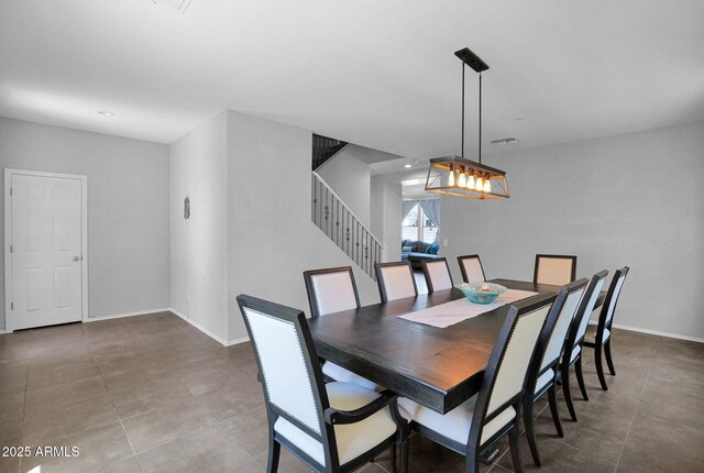 3436 E Gary Way, Gilbert, AZ 85234 - dining area featuring tile patterned floors, stairway, baseboards, and recessed lighting
