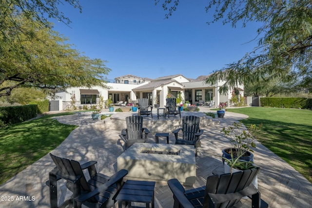 view of patio with an outdoor fire pit