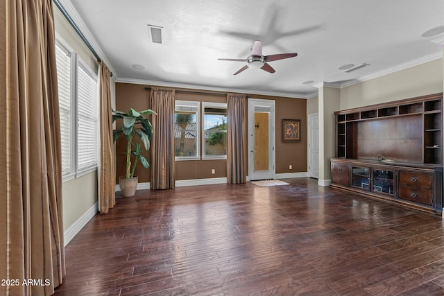 unfurnished living room with dark wood-type flooring, ceiling fan, and crown molding