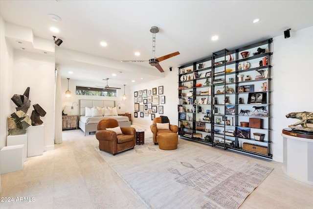 living area featuring ceiling fan