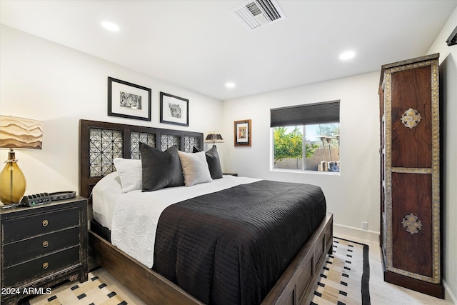 bedroom featuring light tile patterned flooring