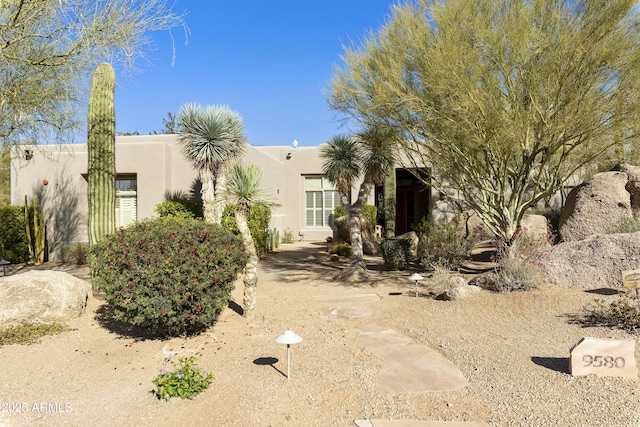 view of pueblo revival-style home