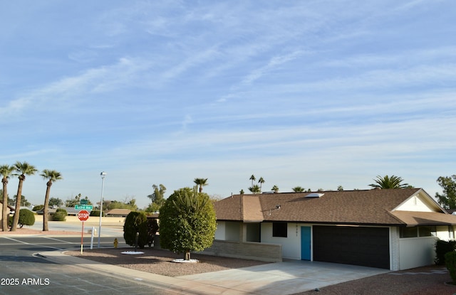 view of front of property with a garage