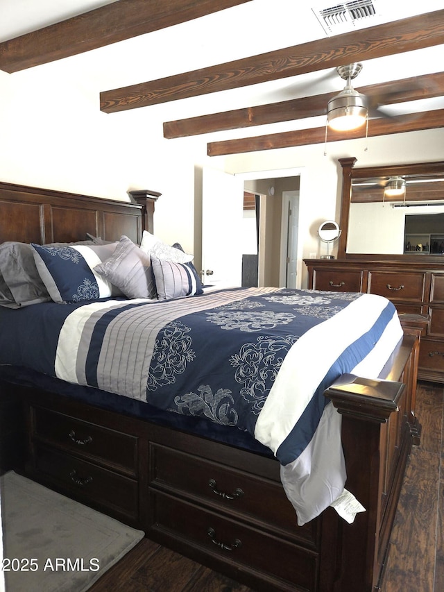 144 N Cactus Rd, Apache Junction, AZ 85119 - bedroom with dark wood-style floors and beamed ceiling