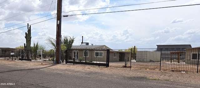 144 N Cactus Rd, Apache Junction, AZ 85119 - view of front of house with a fenced front yard and a gate