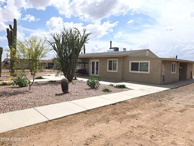 144 N Cactus Rd, Apache Junction, AZ 85119 - ranch-style home featuring a patio and stucco siding