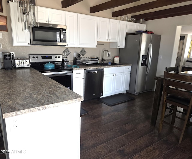 144 N Cactus Rd, Apache Junction, AZ 85119 - kitchen featuring appliances with stainless steel finishes, a sink, beam ceiling, dark wood-style flooring, and white cabinetry