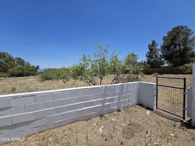 exterior space with a gate and fence