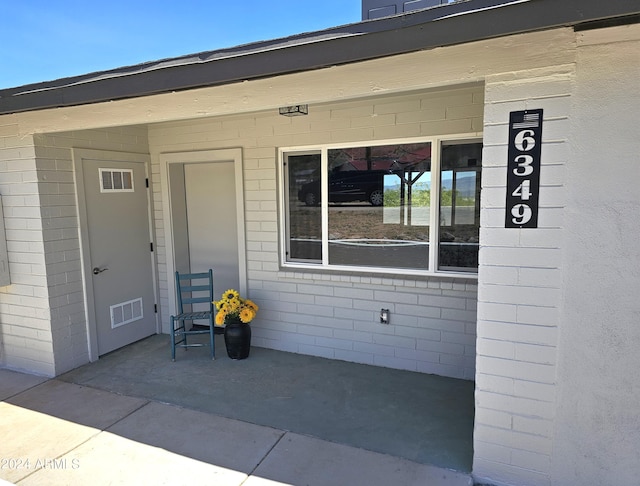 entrance to property with visible vents