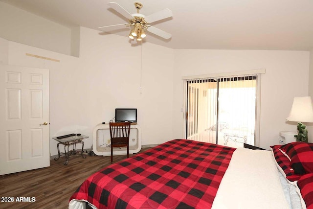 bedroom featuring vaulted ceiling, wood finished floors, and access to exterior