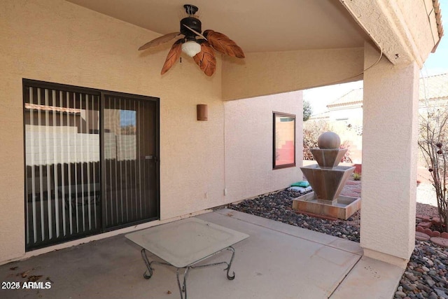 view of patio with ceiling fan