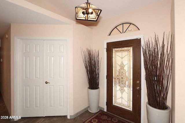 entryway featuring baseboards