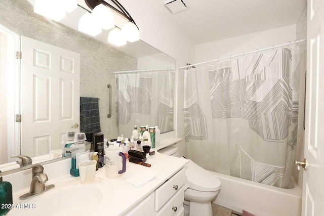 bathroom with toilet, shower / tub combo, visible vents, and vanity