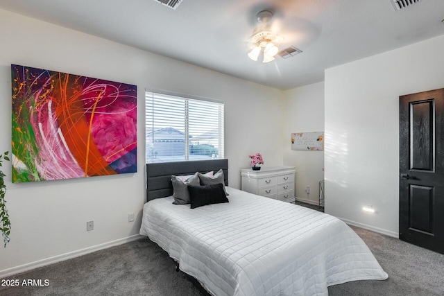 carpeted bedroom with visible vents and baseboards