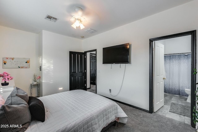 carpeted bedroom with baseboards and visible vents