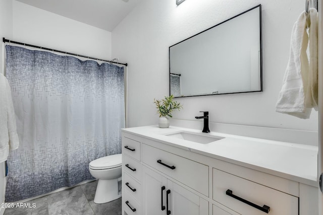 full bathroom featuring vanity and toilet