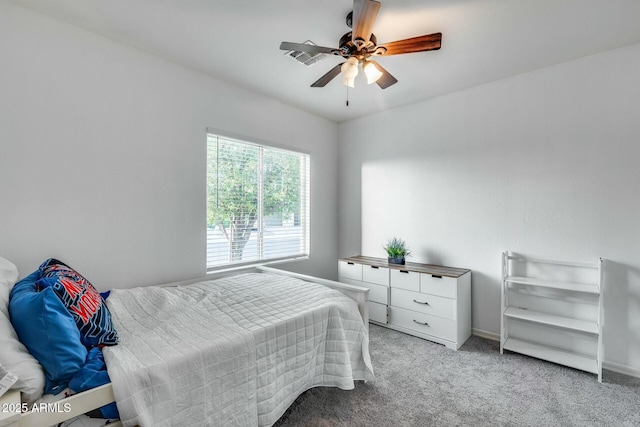 bedroom with a ceiling fan, baseboards, light colored carpet, and visible vents