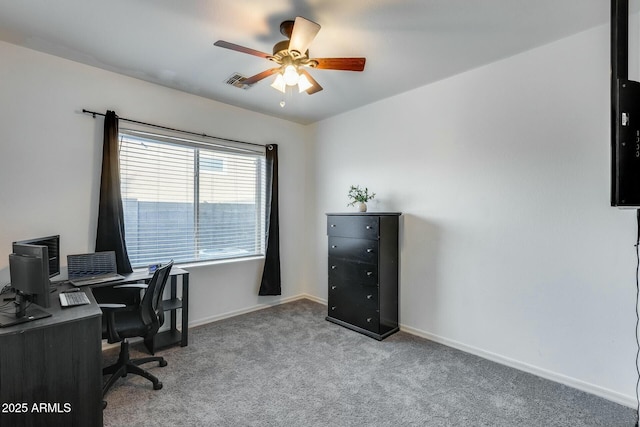home office featuring carpet floors, baseboards, a ceiling fan, and visible vents